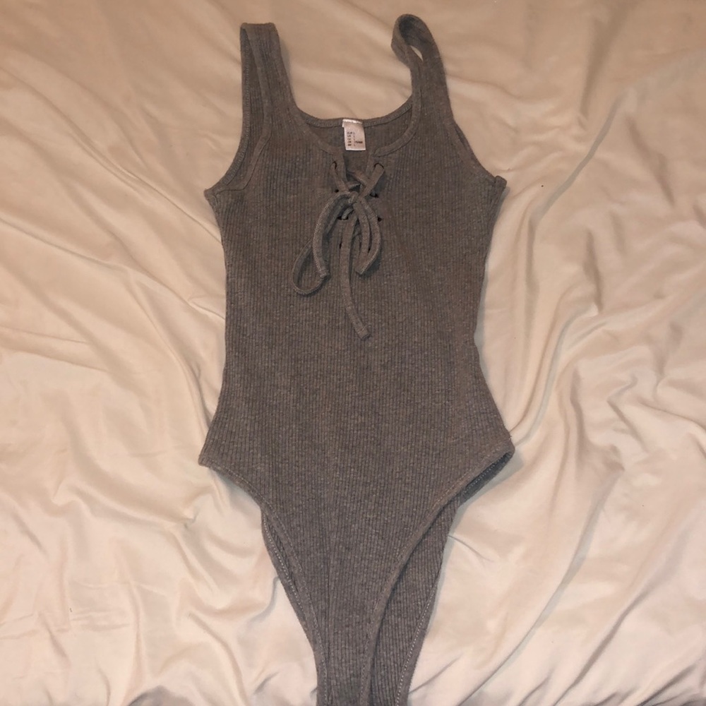 Grey tie up body suit